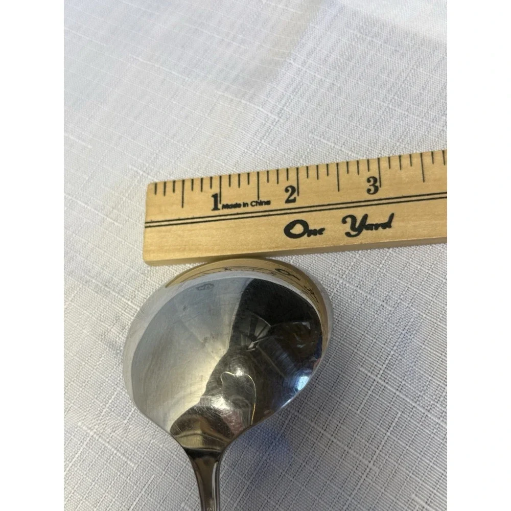 One Oneida Stainless Steel Serving Spoon Flared Handle Rectangular Base